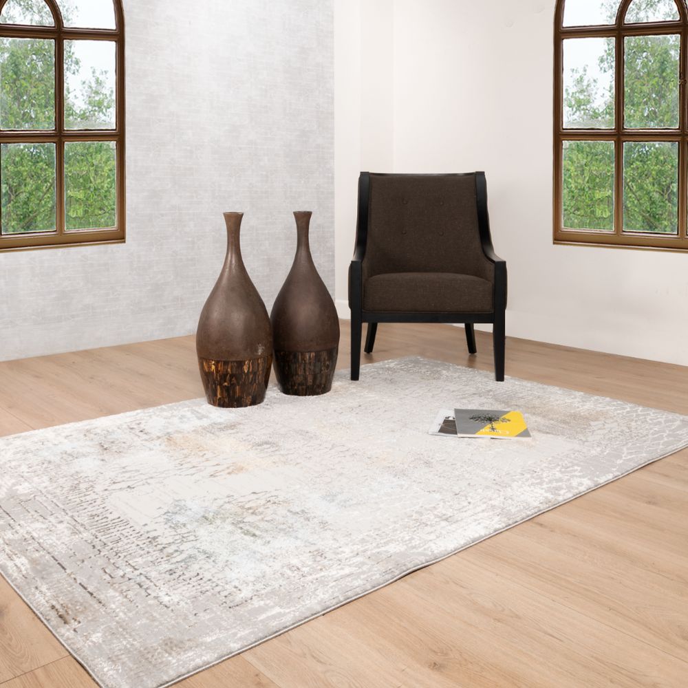 Tapete decorativo colección Zaria rectangular y circular en poliéster gris crema de pelo corto