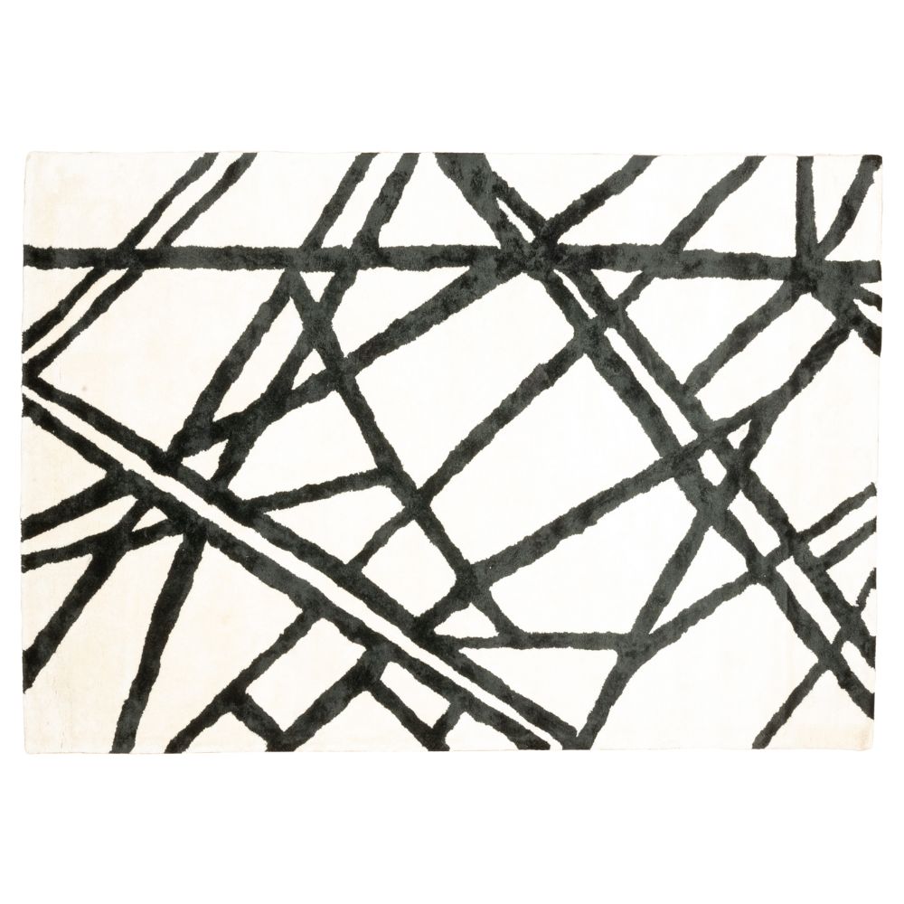 Tapete decorativo colección Gaya rectangular en viscosa y algodón marfil con negro de pelo corto