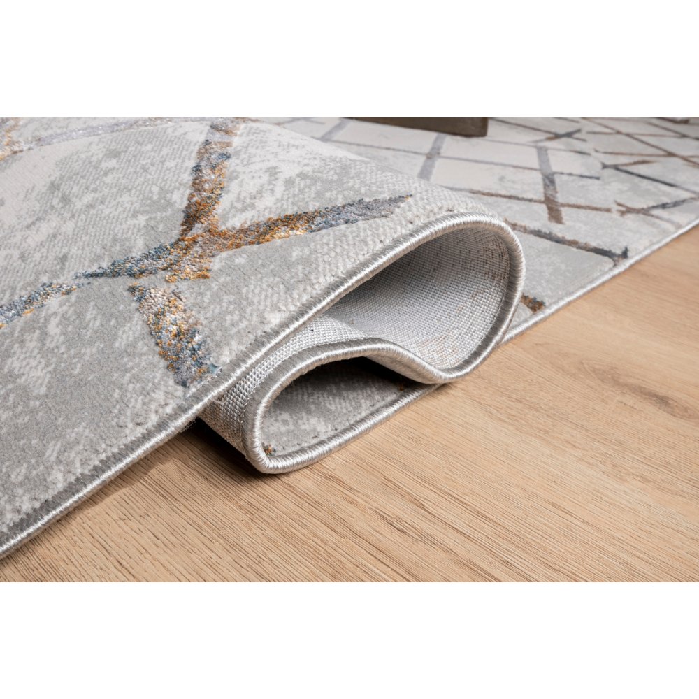 Tapete decorativo colección Adara T2259 rectangular de poliéster pelo corto en tonos oro, gris y azul