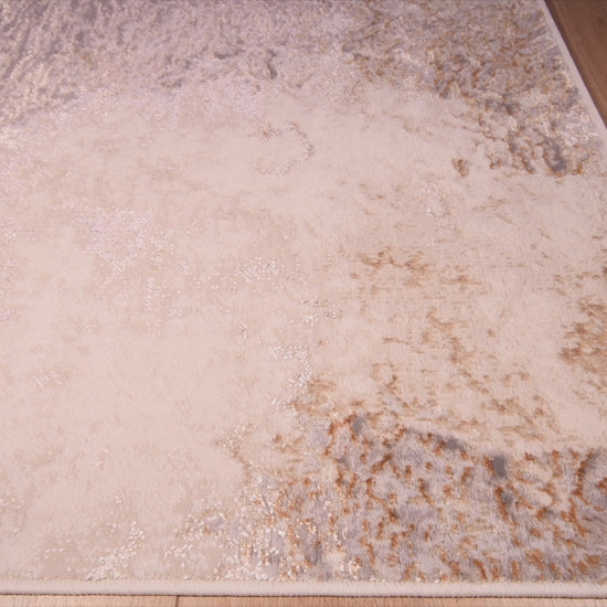 Tapete decorativo colección Terra T9035 rectangular de poliéster y polipropileno pelo corto en crema y oro