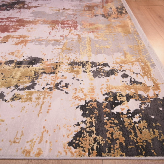 Tapete decorativo colección Civita rectangular en tonos crema, gris y oro