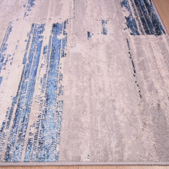 Tapete decorativo colección Deniz U7015 rectangular de poliéster en tonos gris, crema y azul