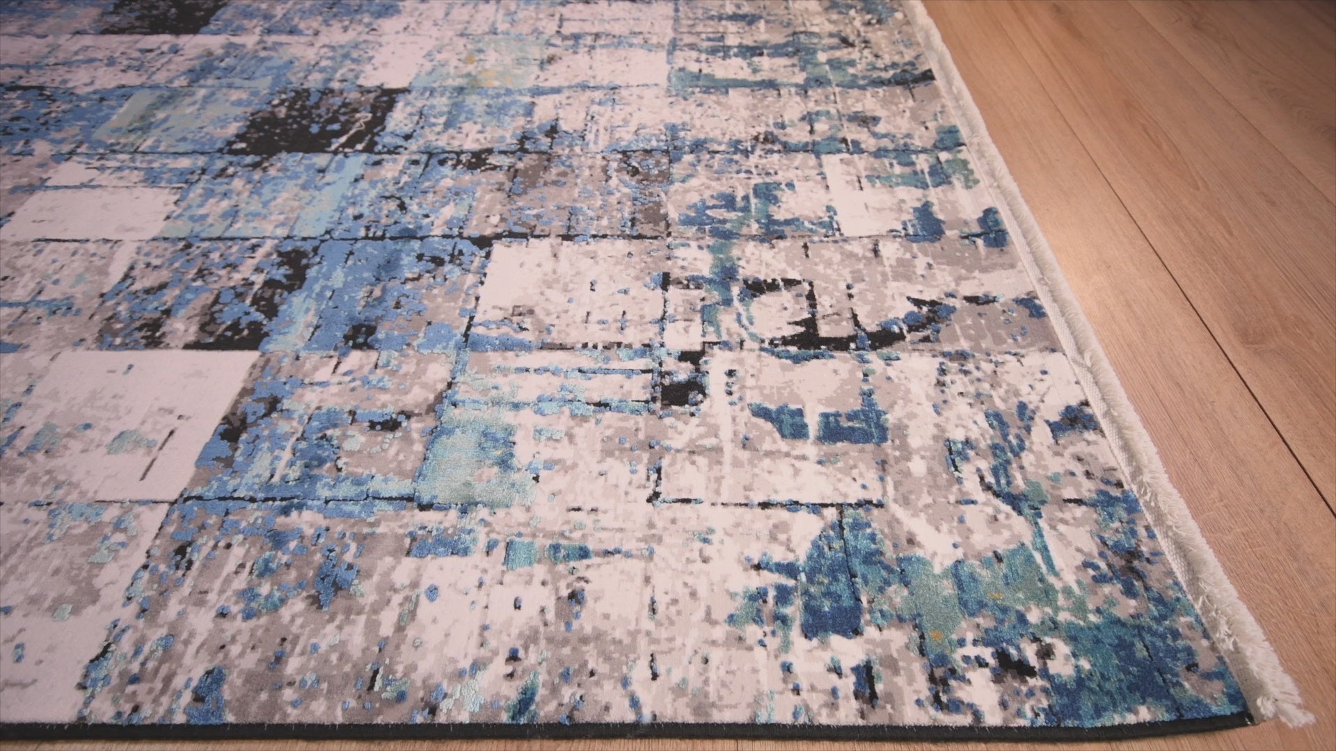 Tapete decorativo colección Civita rectangular en tonos turquesa, gris y oro