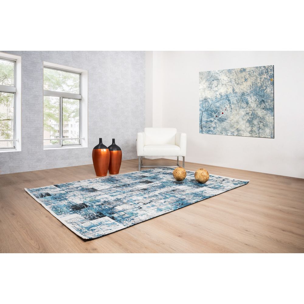 Tapete decorativo colección Civita rectangular en tonos turquesa, gris y oro