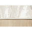 Tapete decorativo colección Deniz rectangular en poliéster crema y verde de pelo corto