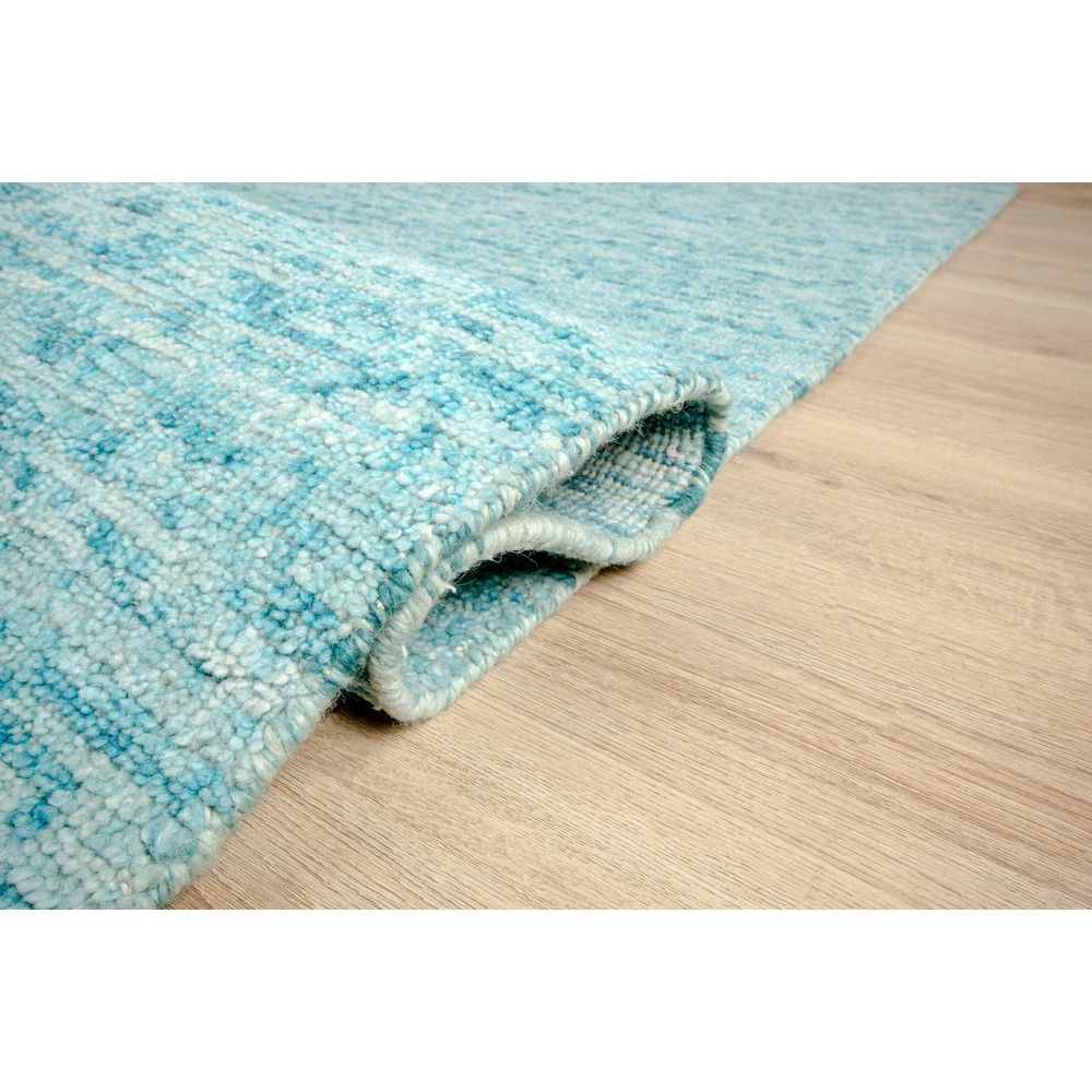 Tapete decorativo colección Malda N8016 rectangular en lana y viscosa color azul turquesa