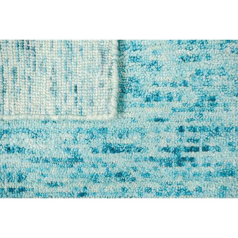 Tapete decorativo colección Malda N8016 rectangular en lana y viscosa color azul turquesa