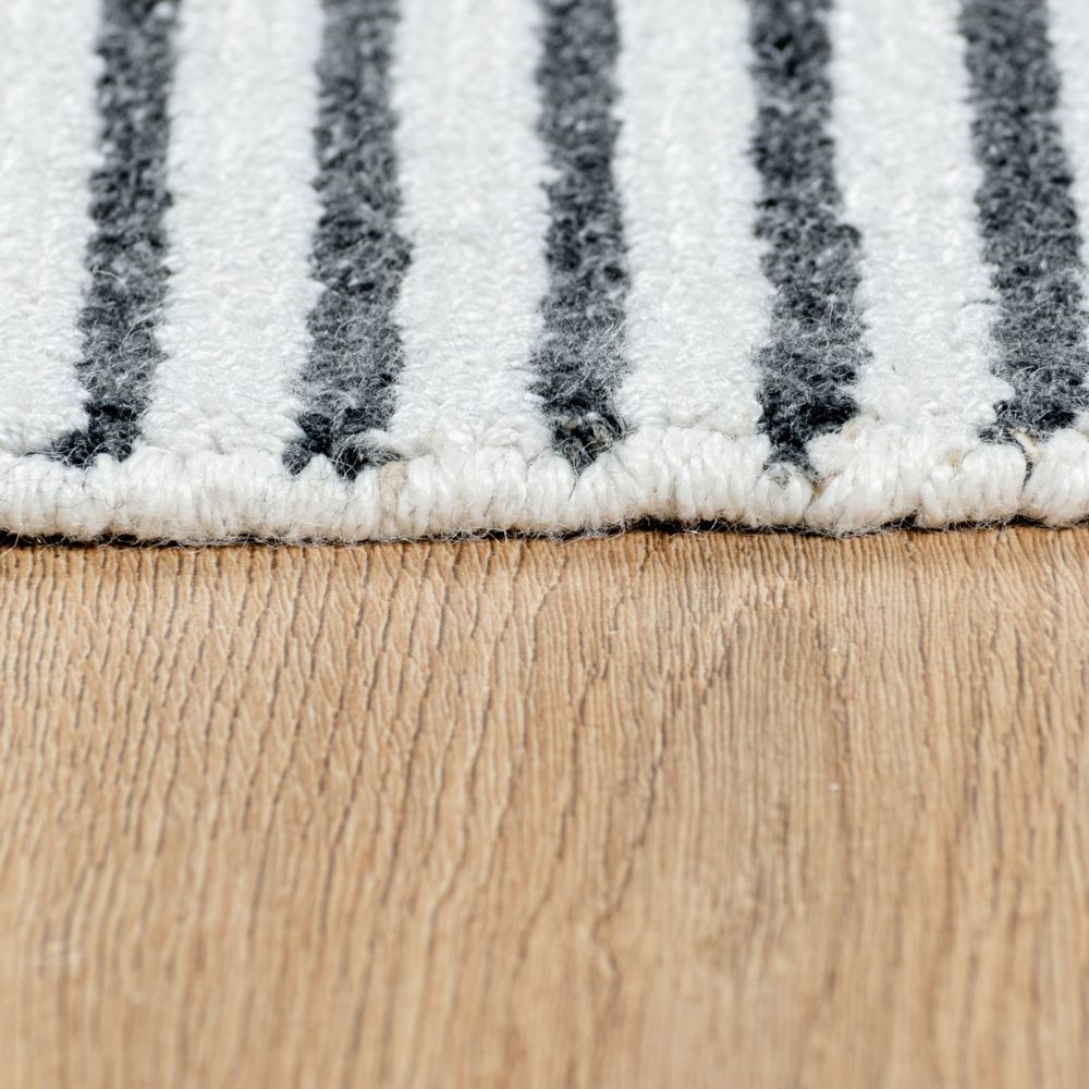 Tapete decorativo colección Myra D2022 rectangular de polietileno pelo corto en tonos beige y gris
