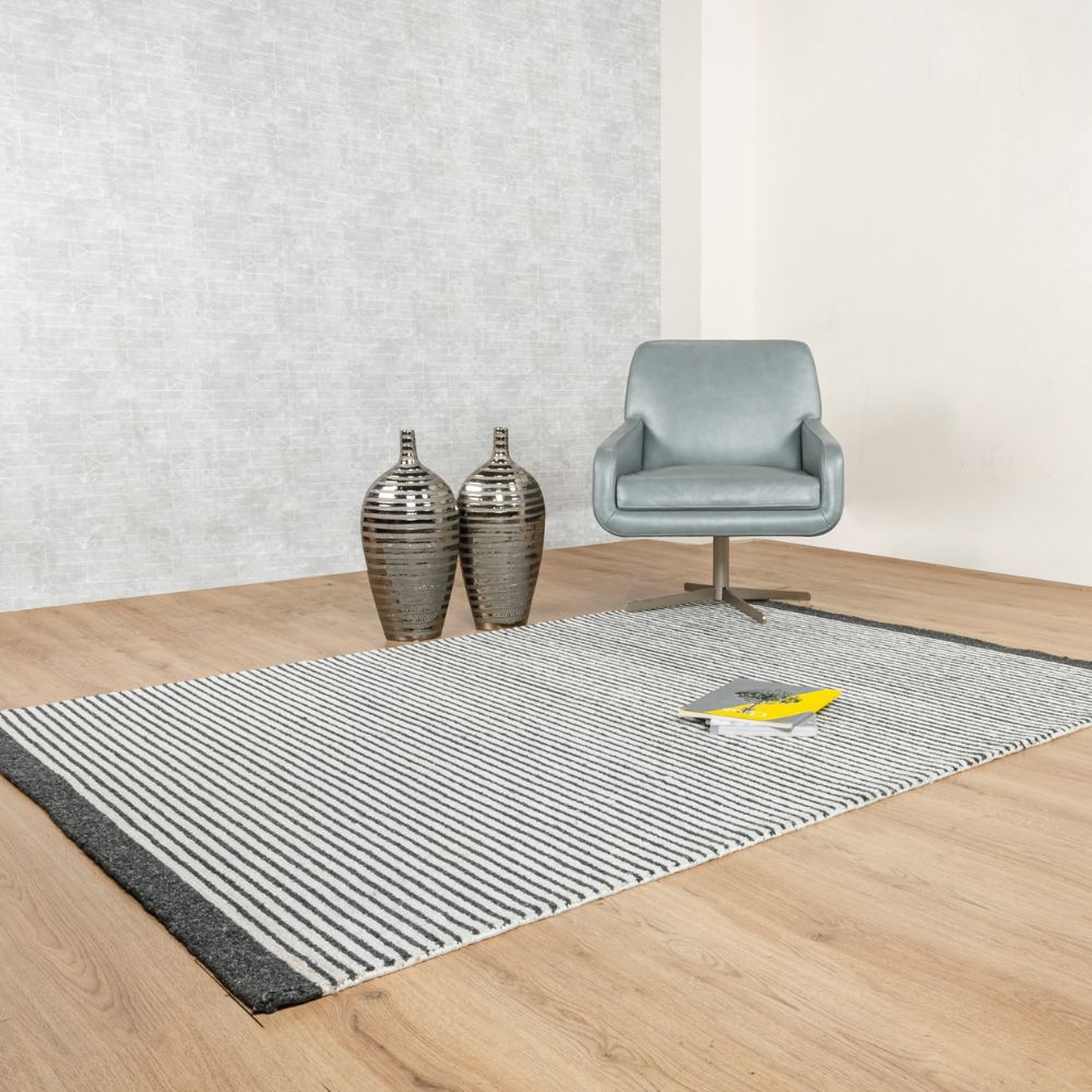 Tapete decorativo colección Myra D2022 rectangular de polietileno pelo corto en tonos beige y gris