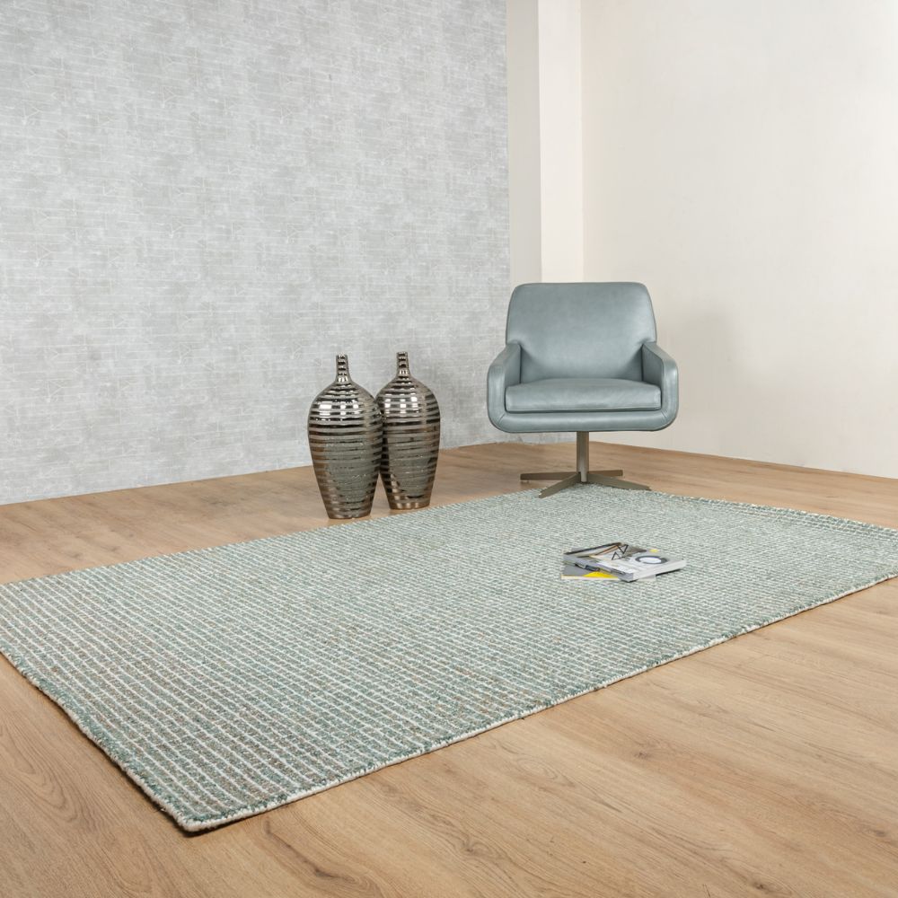 Tapete decorativo colección Myra D2023 rectangular de polietileno en tonos turquesa y beige