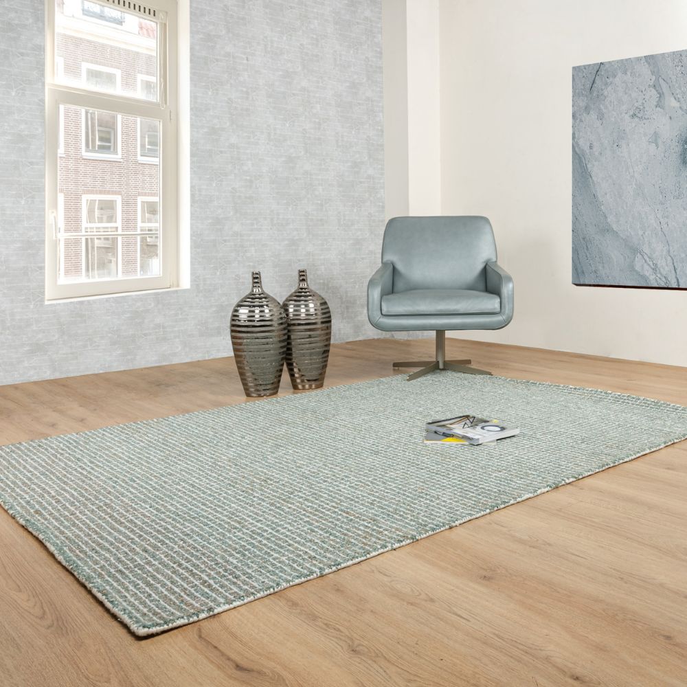 Tapete decorativo colección Myra D2023 rectangular de polietileno en tonos turquesa y beige