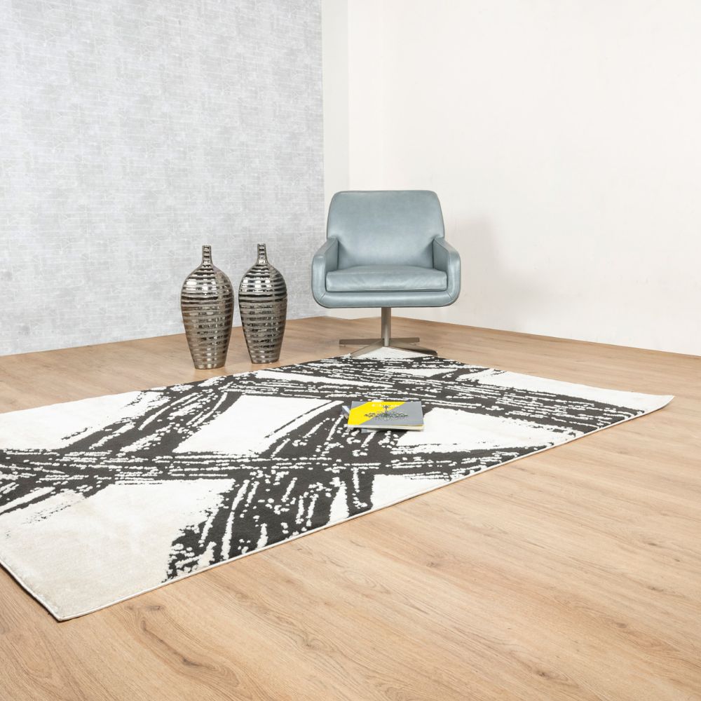 Tapete decorativo colección Optika rectangular en poliéster crema con negro de pelo corto