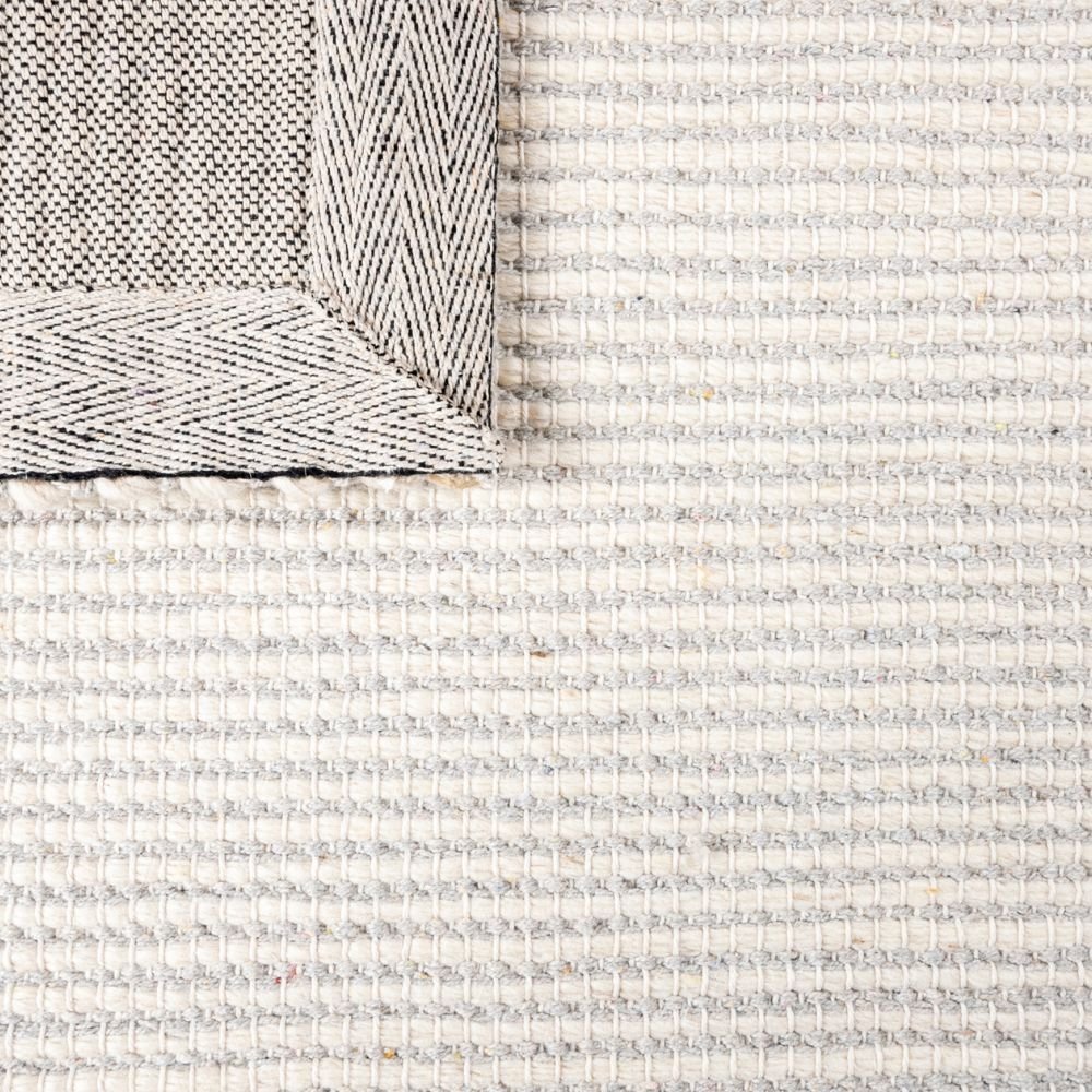 Tapete decorativo colección Saira D1004 rectangular de poliéster, algodón y lana en marfil y plata