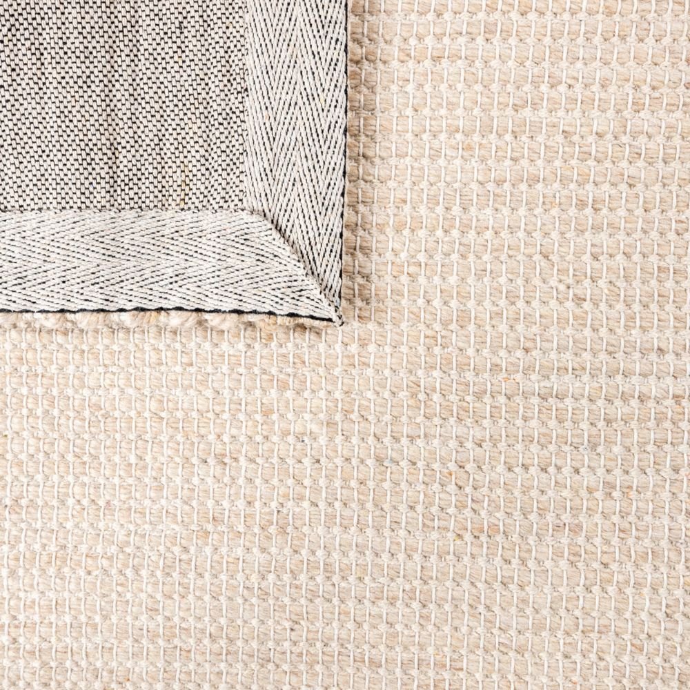 Tapete decorativo colección Saira D1006 rectangular en poliéster y lana color marfil beige