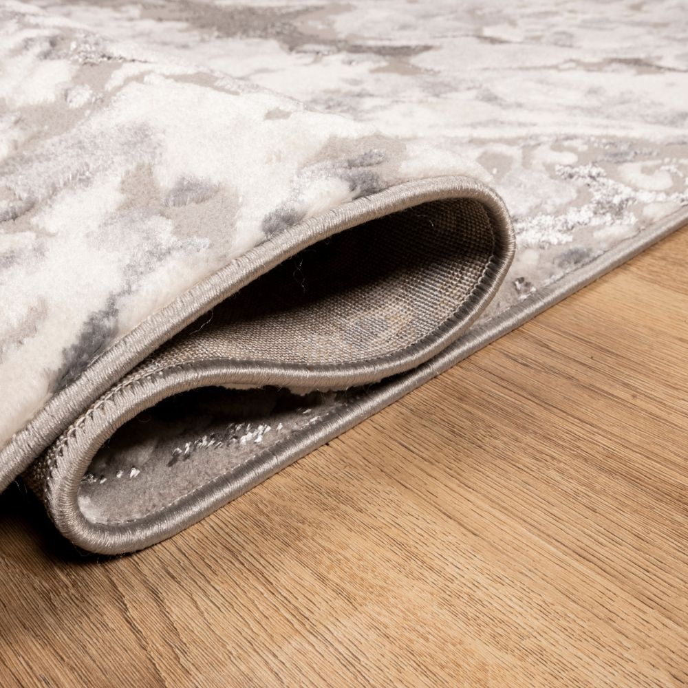 Tapete decorativo colección Samira rectangular en poliéster y polipropileno gris plata de pelo corto