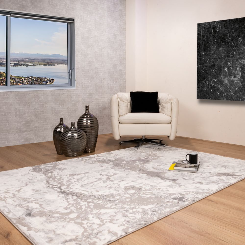 Tapete decorativo colección Samira rectangular en poliéster y polipropileno gris plata de pelo corto