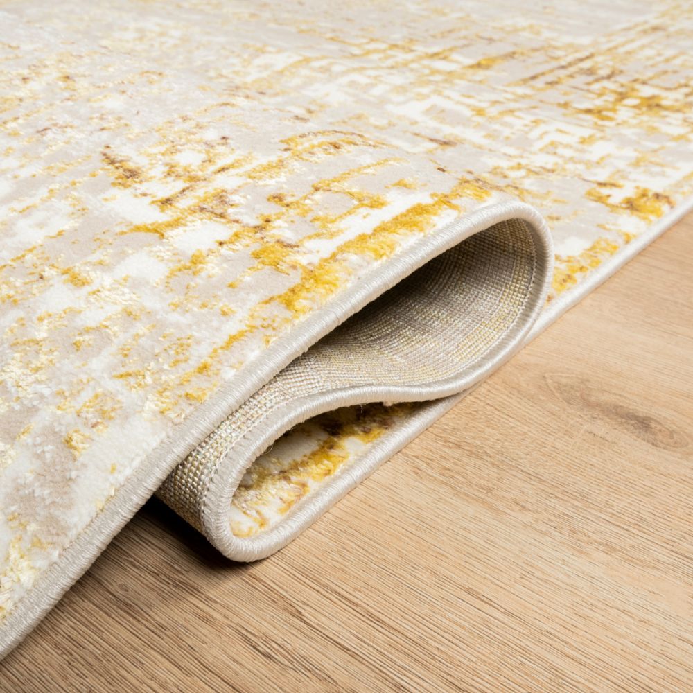 Tapete decorativo colección Sibel U7005 de poliéster en oro crema, rectangular o circular