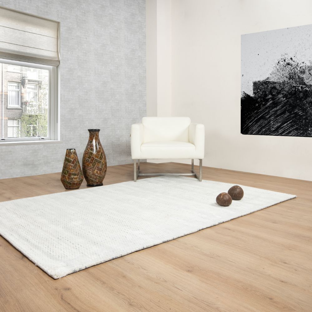 Tapete decorativo colección Thane N4001 rectangular de viscosa y lana en crema gris