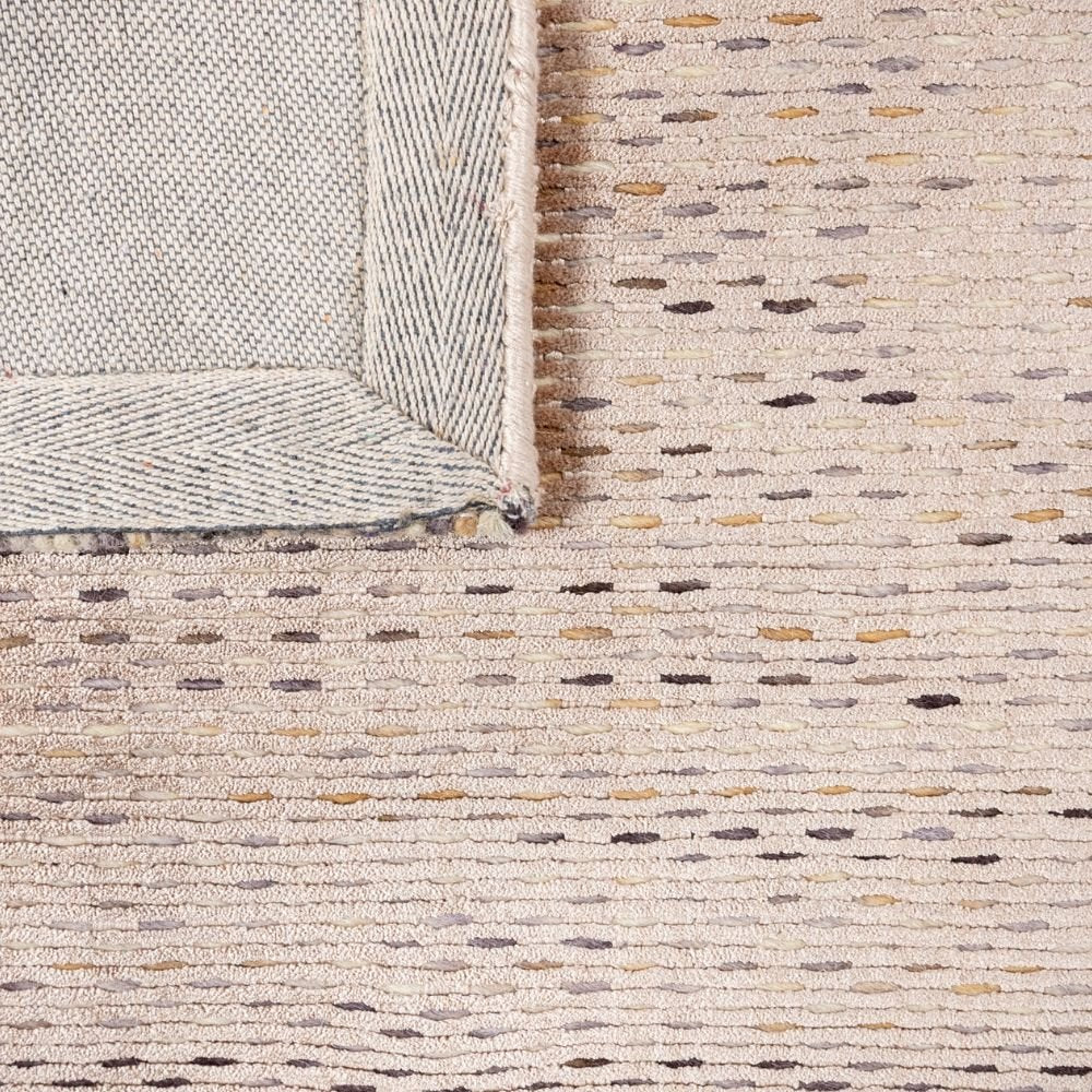Tapete decorativo colección Thane rectangular en viscosa y lana oro gris de pelo corto