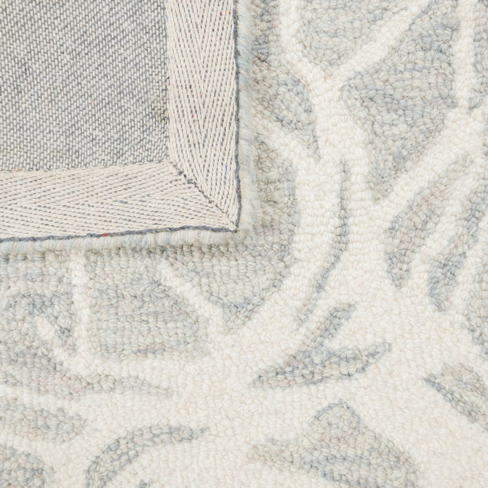 Tapete decorativo colección Vani D2004 rectangular de lana y algodón en tonos beige y crema