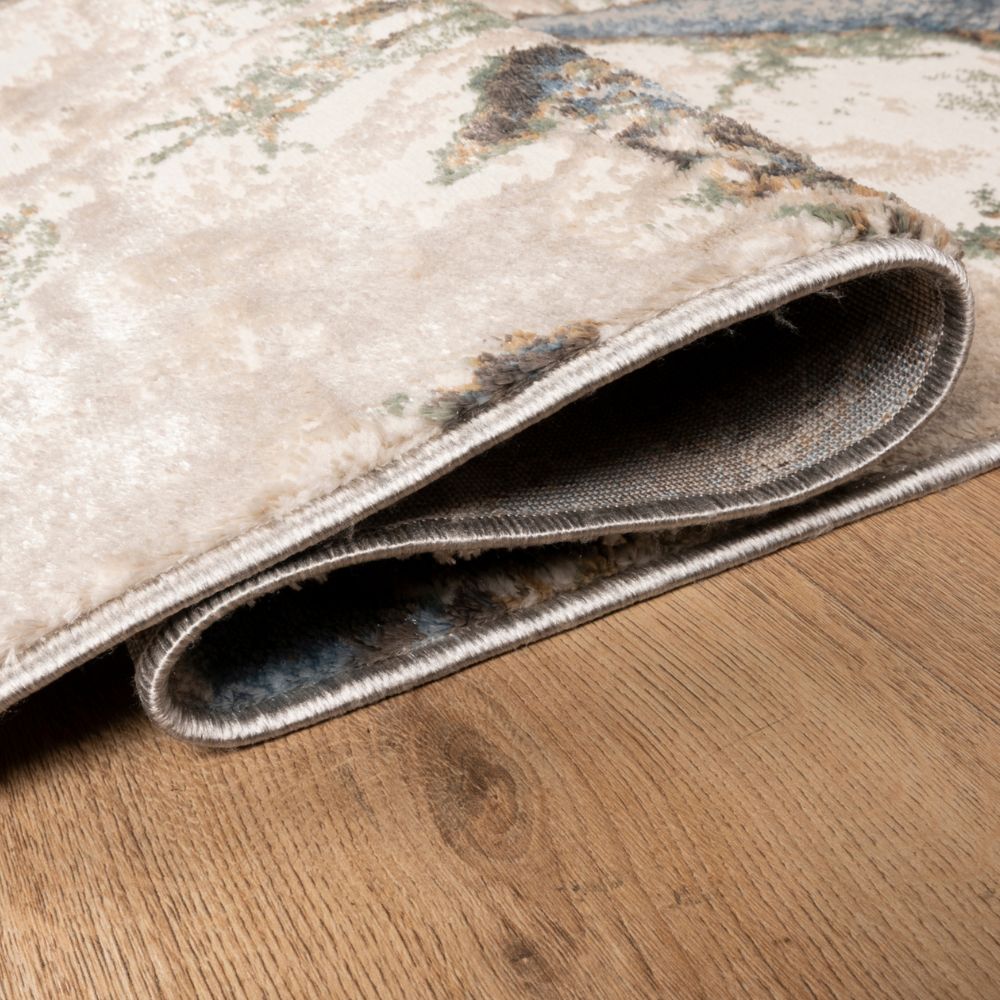 Tapete colección Zaria T2185 rectangular y circular de poliéster pelo corto en tono gris crema