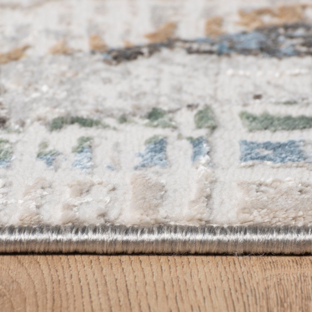 Tapete colección Zaria T2233 rectangular y circular de poliéster pelo corto en tono gris crema